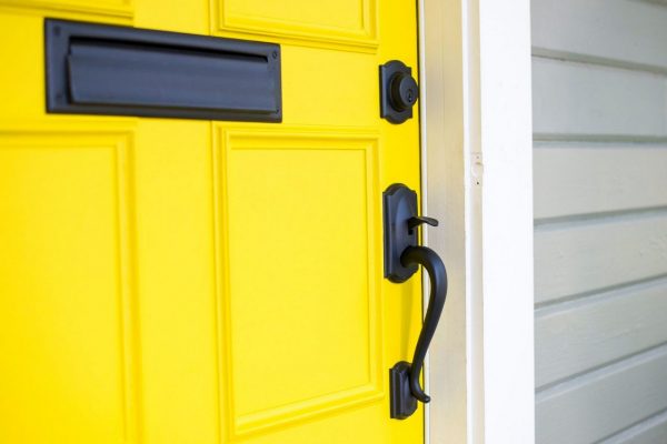 A Yellow Door with a Handleset Doorknob | Door Hardware | Hannapel