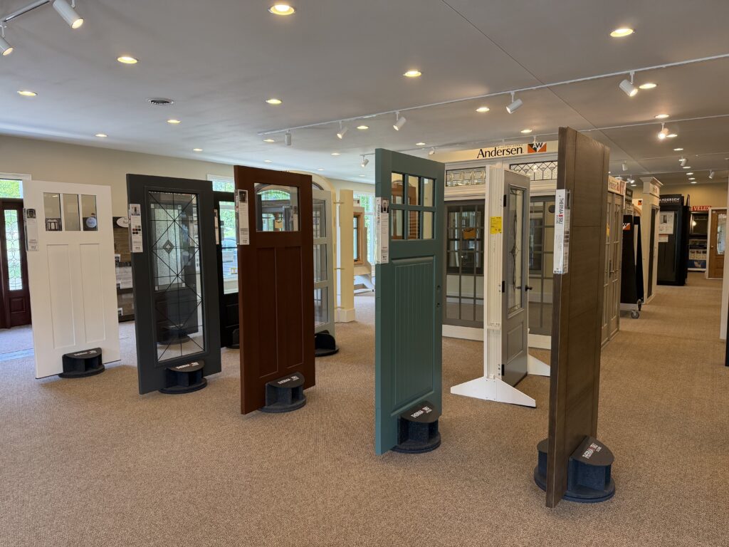 Steel and fiberglass entry doors on display in a Hannapel showroom